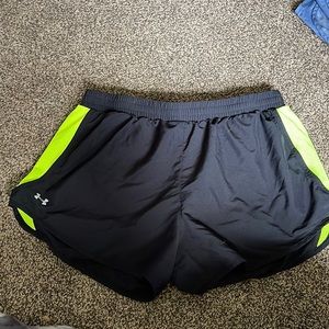Black and neon green under armour athletics shorts